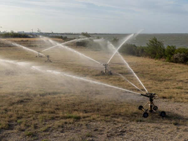 Wind and Sprinkler Heads Toward La Porte